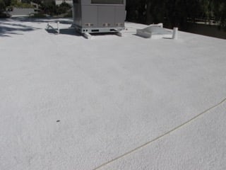 Picture of a recent foam roofing project for a Phoenix commercial client