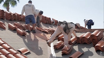 Skilled Roofers Installing A New Roof On A Home In Arizona