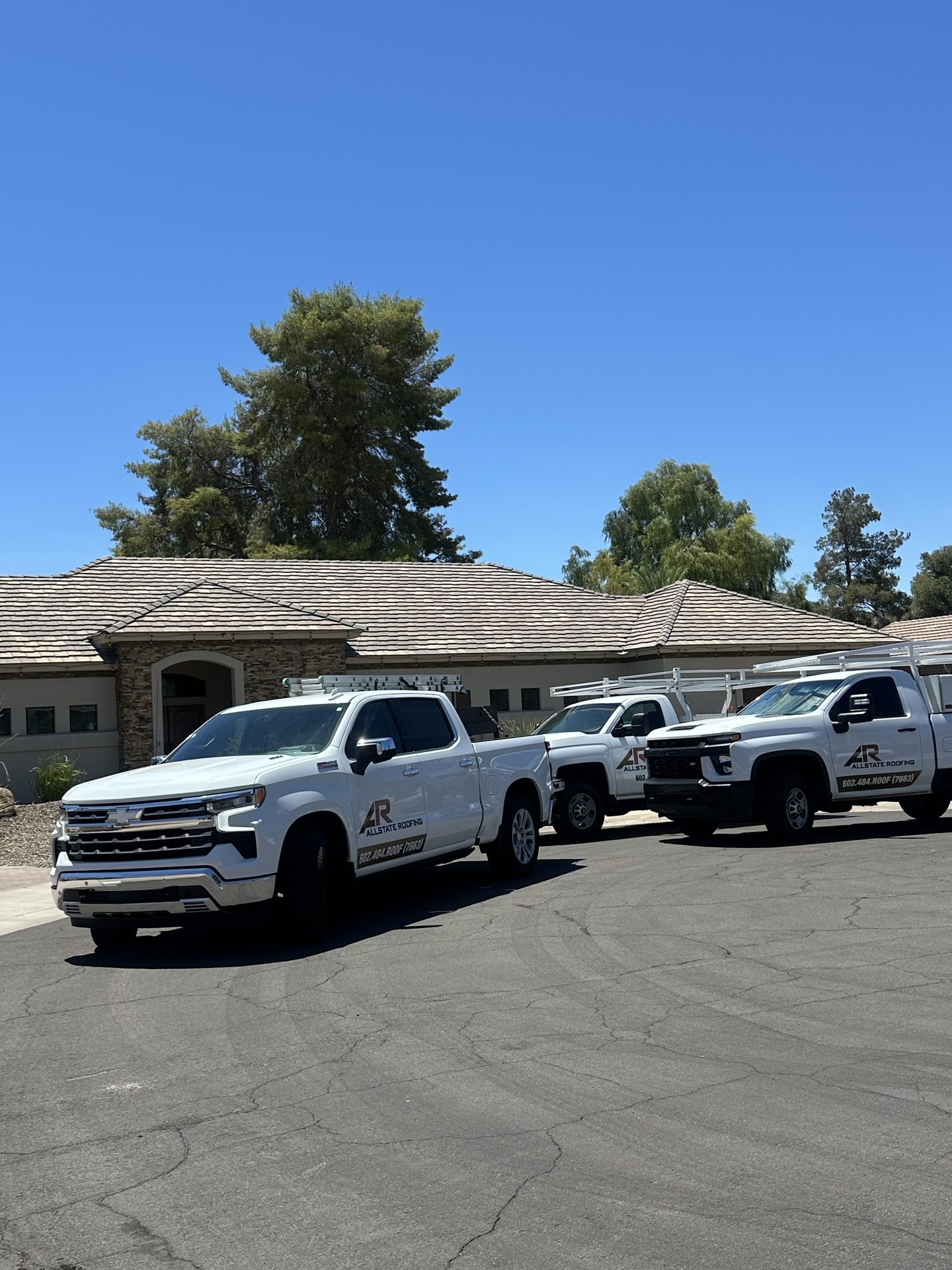 Allstate Roofing truck parked at a roofing job site