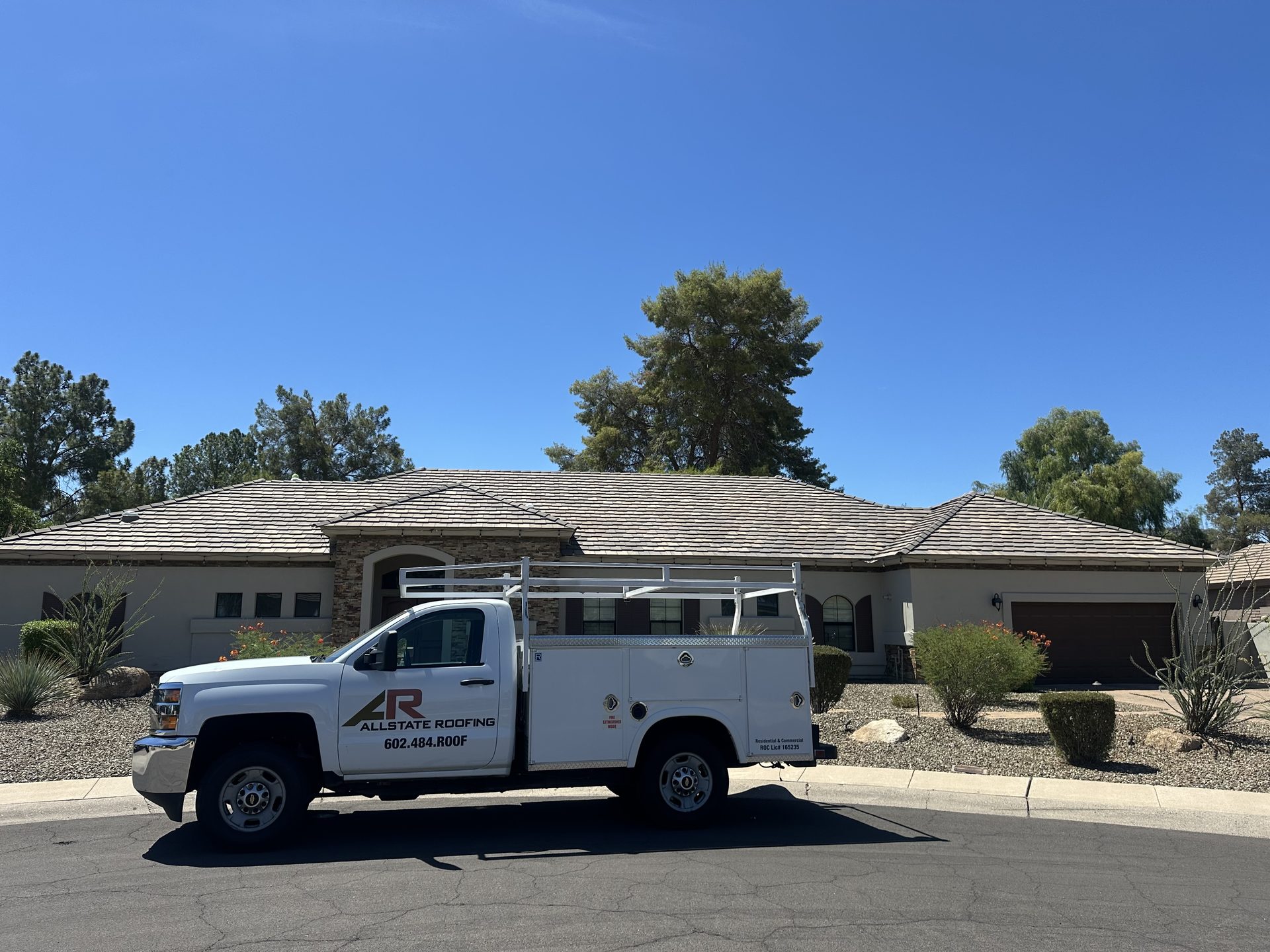 Allstate Roofing Truck at Tile Roof Home Allstate Roofing service truck at a tile roof home